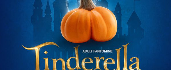 a pumpkin shaped suggestively like buttocks against a blue fairytale castle backdrop, with the tagline “Two Big Balls One Happy Ending!”