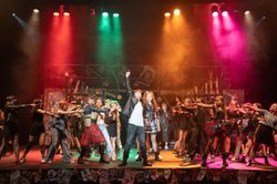 RYC performing on stage 'We Will Rock You'