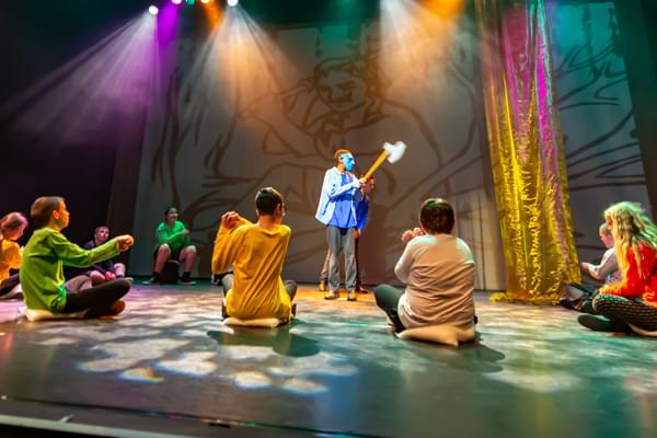 A group of children performing on stage