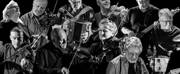 Feast of Fiddles playing instruments.