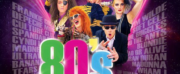 featuring performers in vibrant 1980s-inspired outfits (punk, pop, and new wave styles) against a neon retro background, with text describing it as “the best 80s show in the universe” and comparing it to Live Aid and Top of the Pops.