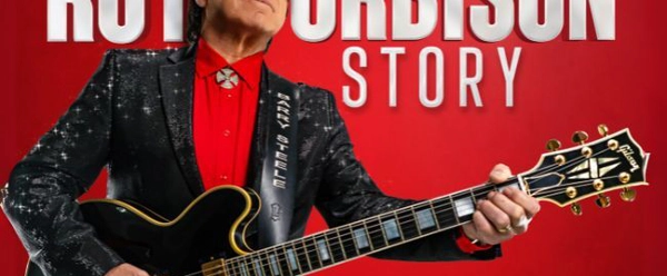 Man holding a guitar