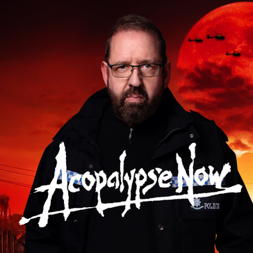 Alfie in a dark police jacket, standing against a fiery red sky with a large red moon and silhouettes of helicopters in the background. The stylized title text reads “Acopalypse Now” across the image.