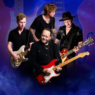 Four guitarists in the centre.