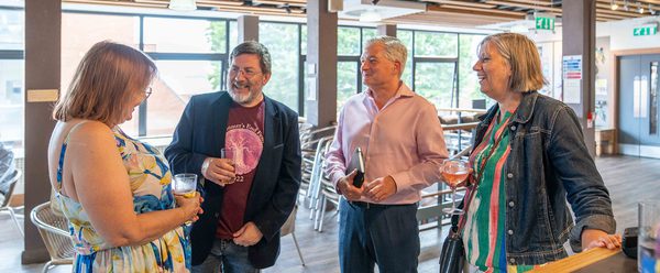 People stood laughing.