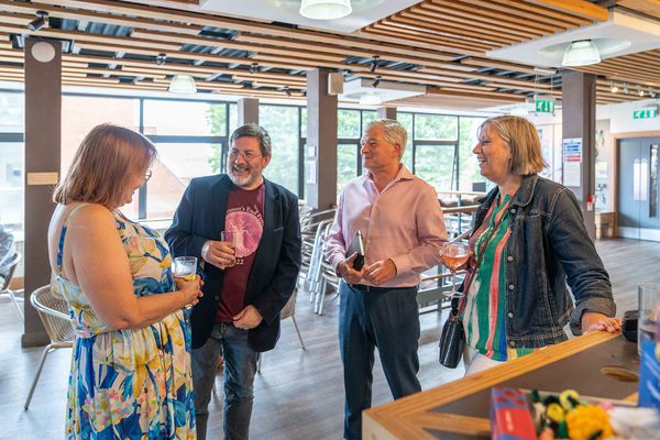 People stood laughing.